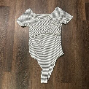 Black and cream bodysuit, fits like a small